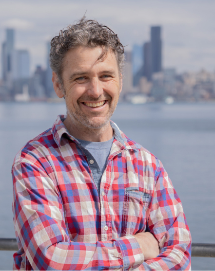 Ian Franks Portrait of partner and field operations manager Ian Franks with the Seattle skyline in the background